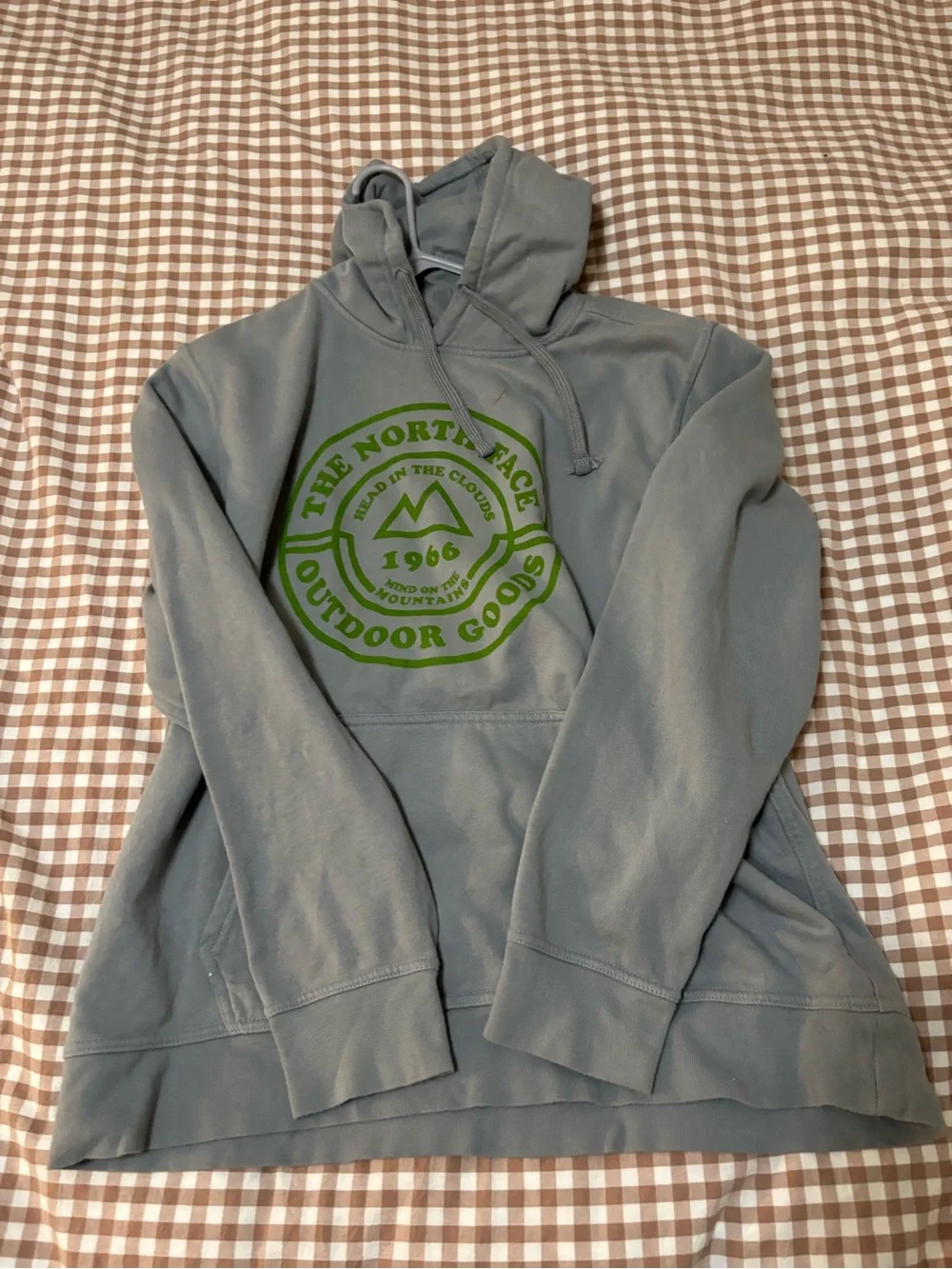 The North Face Light Gray Hoodie with Black Logo Tag